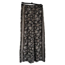 American Eagle Women  s Black and Tan Wide Leg Floral Pants Size Small