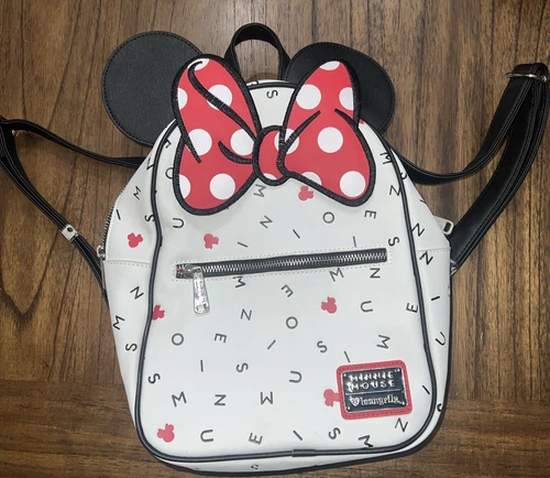 RARE Disney Loungefly Minnie Mouse Backpack NWOT tape still on Straps !!