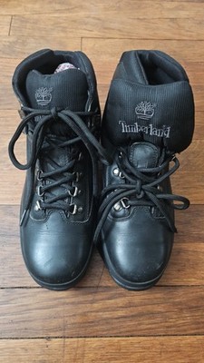Classic black Timberland Field Boots. These are high-top style with black laces
