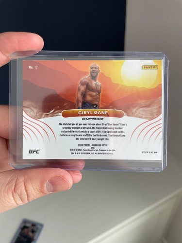Ciryl Gane Rising Suns White Sparkle Prizm - 2022 Panini Donruss Optic UFC - Imagen 2 de 2