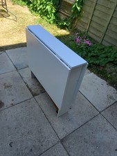 Slim Line White Folding Table On Wheels