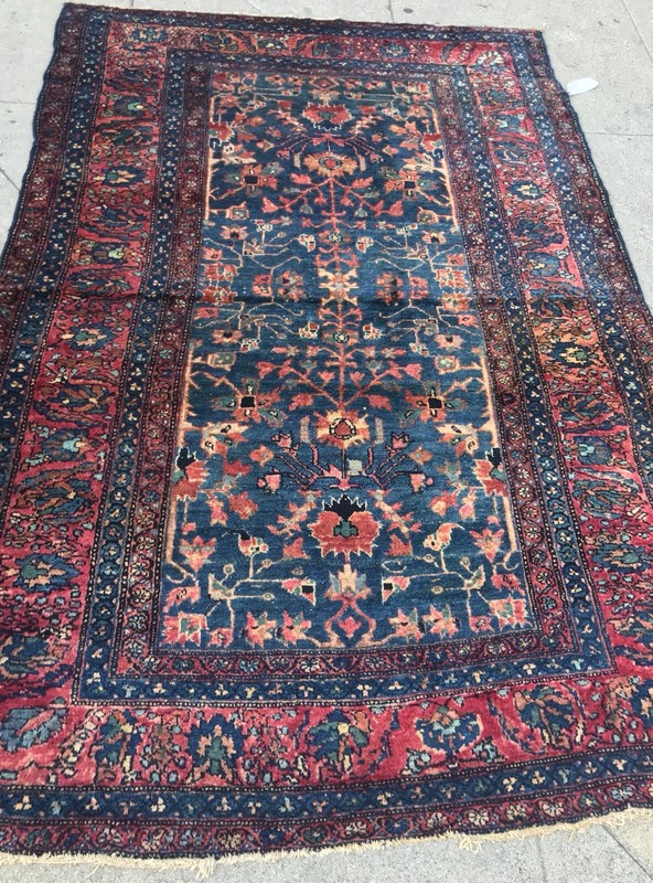 AN AWESOME BLUE BACKGROUND COLOR FLORAL RUG