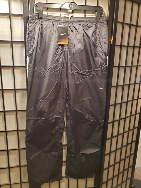 nike black pants with white stripes
