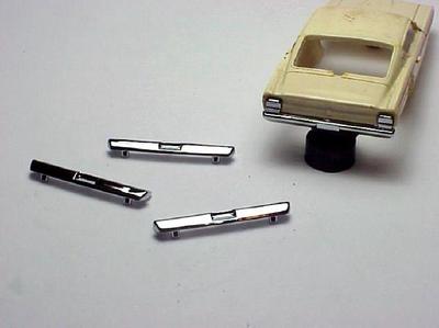 T-JET FORD TORINO REAR BUMPER WITH TAIL LIGHTS. NEW INJECTION MOLDED
