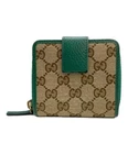 GUCCI                    Round zipper wallet beige 346056