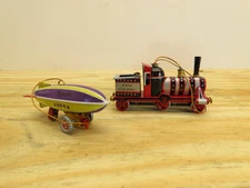 ZZ Germany Tin Toy Graf Zeppelin Airship and Tin Toy Steam Train