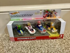 Hot Wheels MARIOKART 4 Pack NIB Princess Peach Mario Orange Shy Guy Yoshi