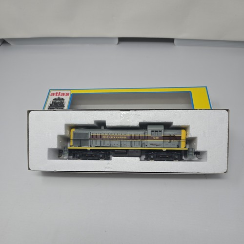 Locomotora diésel carretera Atlas/Kato drive 7077 HO Erie Lackawanna RS-3 #1039  | Condition: New