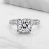 DIAMOND ENGAGEMENT RING WITH A 1.00 CARAT CENTER / BAGUE DE FIANCAILLE AVEC DIAMANT DE 1.00 CARAT