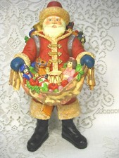 VINTAGE LOOKING SANTA 10  1/2" TALL RED OUTFIT BAG OF TOYS ON BACK  FRONT