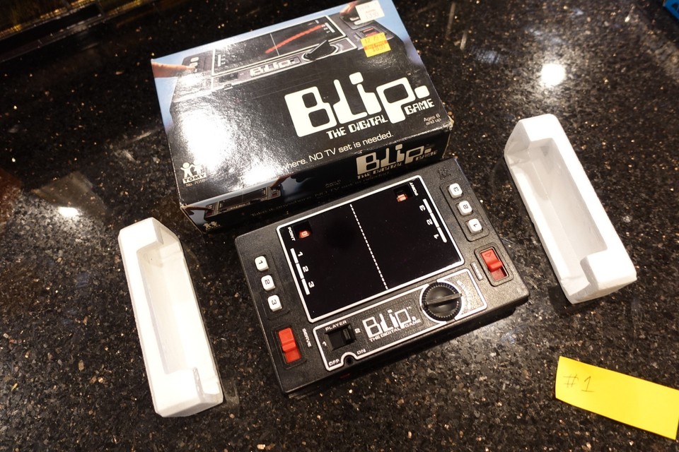 New-in-box TOMY BLIP is a mechanical LCD-free pong-on-a-wheel toy — a true pre-video-game artifact that still works purely on spinning discs and LEDs.