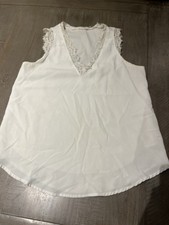 White No Sleeve Lace Shirt