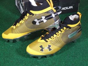 yellow spotlight cleats