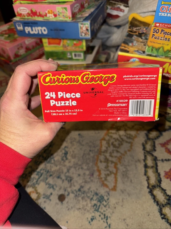 Quebra-cabeça Curious George 2010 Pressman 24 peças. Completo - Imagem 2 de 2