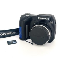 Olympus SP-500 UZ 6.0MP 10x Optical Zoom Bridge Digital Camera, 1GB Memory Card.