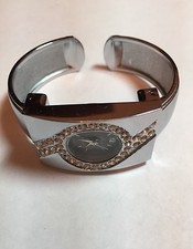 Womens Ladies rhinestone crystal silver tone hinged cuff statement watch