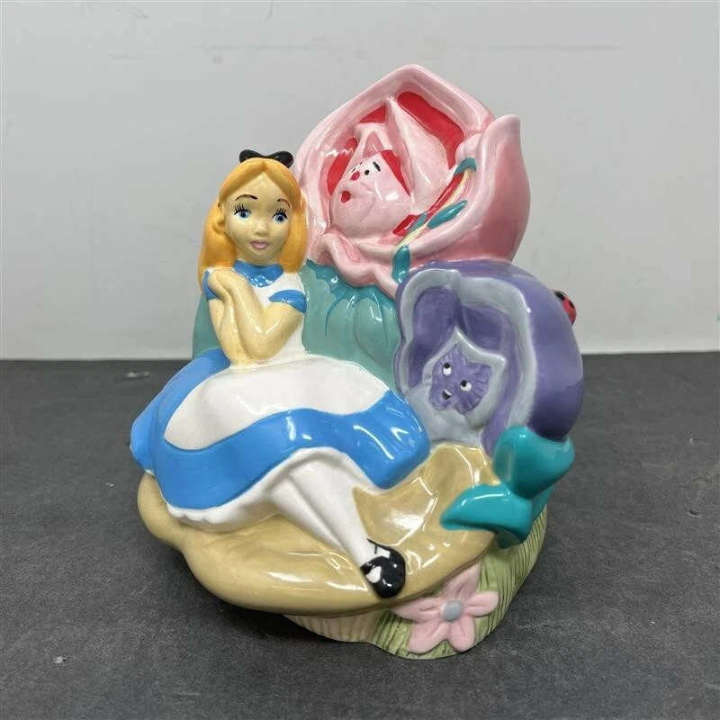 Banco de artesanía del tesoro difícil de encontrar Alicia en el país de las maravillas Foto 2 de 4