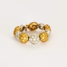CHANTECLER- Bagues souples en or jaune et or gris, diamants et saphirs jaune