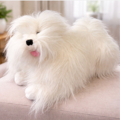 Large Sterling plush stuffed animal, featuring long white fur and a realistic do