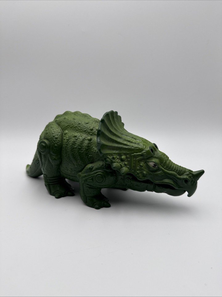 A 1986 MOTU Bionatops dino in used condition is a legitimate piece of childhood nostalgia that 40-something collectors actively hunt — 'As Is' keeps the price honest.