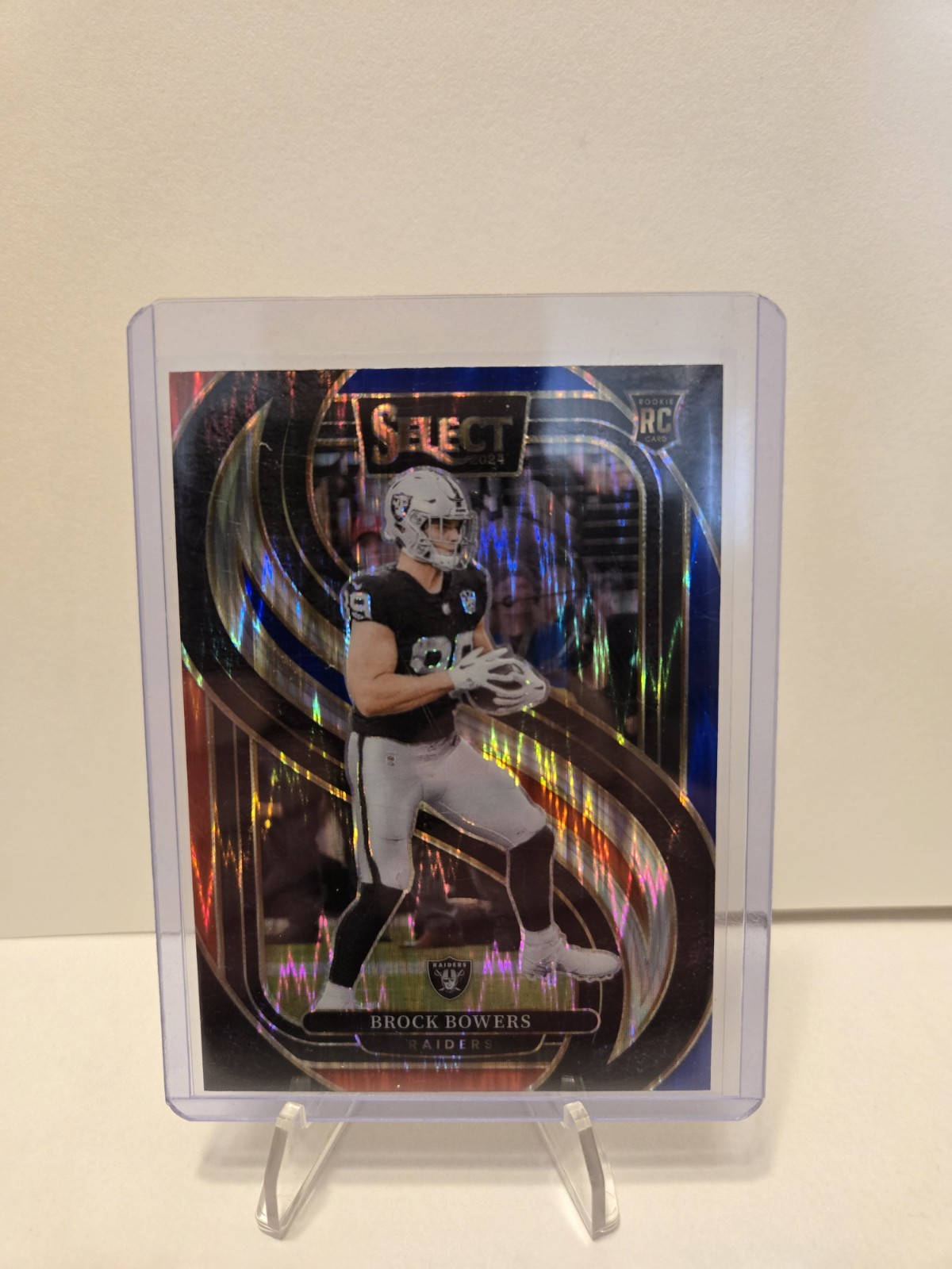 2024 Panini Select - Premier Level Brock Bowers #118 Red & Blue Shock Prizm (RC)