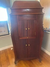 Victrola Full size upright with record storage. Mahogany