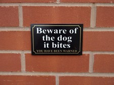 Black beware of the dog it bites you have been warned sign - All Materials