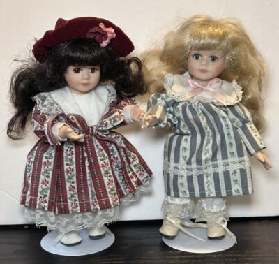 Two Piece Vintage 8  Porcelain Dolls W/ Stands Cloth Bodies Glued Wigs Eyelashes