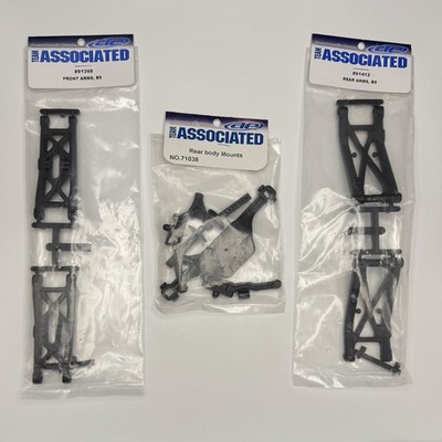 Team Associated Front And Rear Arms And Front And Rear Body Mounts New Sealed