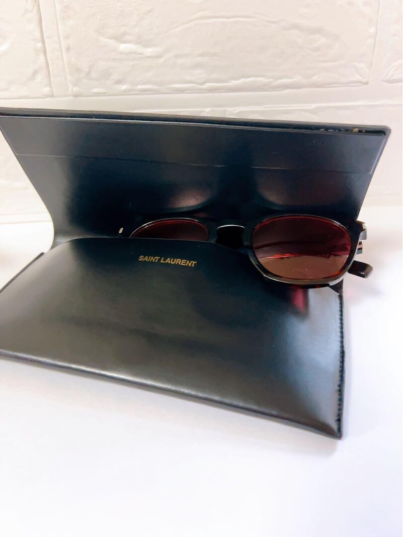 Occhiali da sole donna autentici Yves Saint Laurent con lenti rosa vivaci