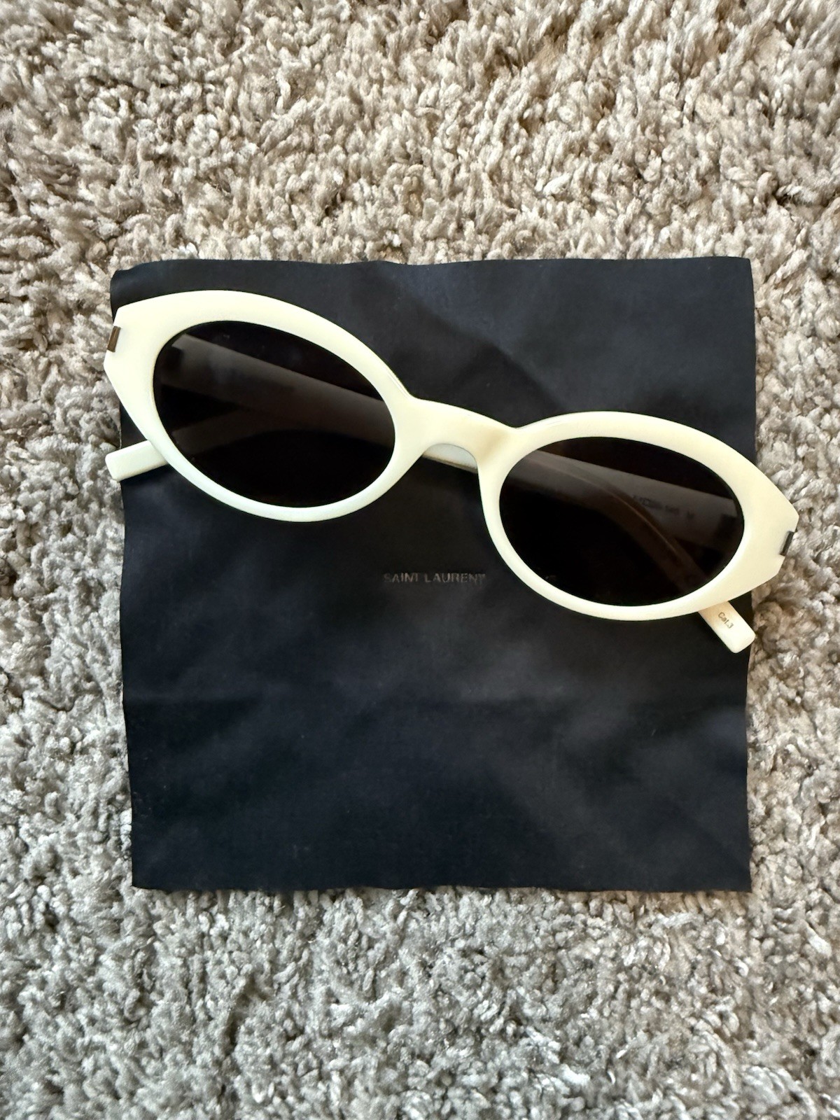 Occhiali da sole Saint Laurent SL 567 100 bianchi ovali unisex nuovi autentici DS