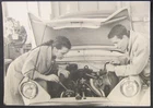 Original snapshot photo c.1960 automobile man and woman hands in engine