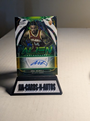 2025-26 Topps Cosmic Chrome Asa Newell Alien Auto Gold Interstellar RC /50 Hawks