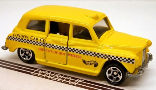 Taxi Hot Wheels Austin FX4 « London Cab Co. » jaune échelle 1/64 (casting Corgi) - Photo 1/2