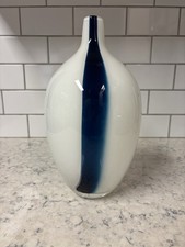 Hand-blown white and blue striped minimalist art glass vase.