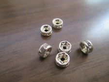 7 "silver" rondelles with clear crystals 5x3mm