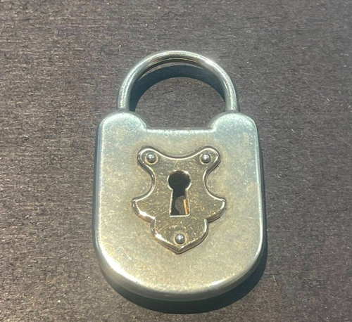 Dije de candado Tiffany & Co plateado con bloqueo de arco - esterlina - 18 k - Imagen 2 de 6