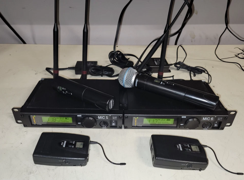 2x Shure ULXP4 Receiver mit 2x ULX2 Handhelds und 2x ULX1 J1 554-590 Mhz