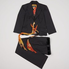 Tuta Dolce Gabbana in lana a righe con pantaloni blazer in seta