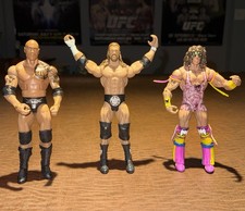 WWE 3 Figure Lot The Rock Ultimate Warrior Triple H (2 Elites)