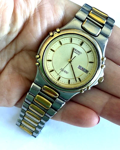 Vintage Men's Watch Seiko SQ 100 5H23 7C89 Quartz Day Date Two Tone Runs