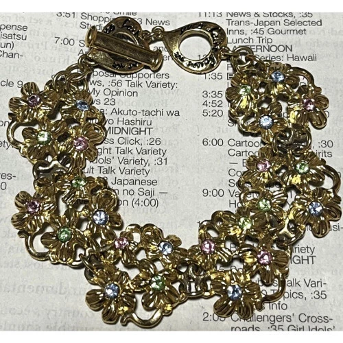 SAINT LAURENT (YSL) Bracciale Yves Saint Laurent YSL Motivo Fiore Strass Placcato Oro 1015