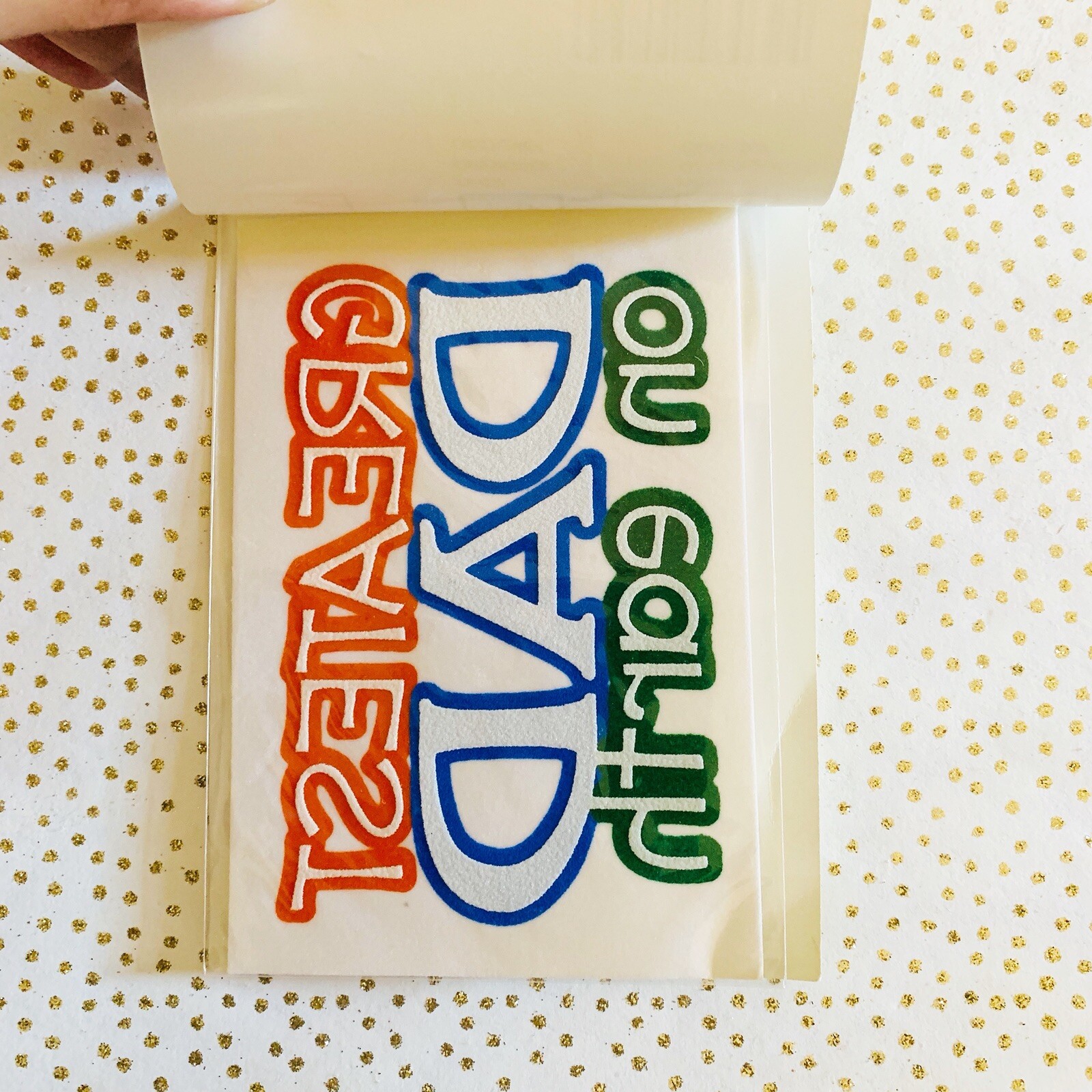 S.E.I. Iron On Art “GREATEST DAD on earth” Flocked Transfer, Approx. 4” x 2 5/8”