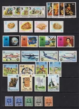Cayman Islands - 33 Mint stamps, cat. $ 39.15