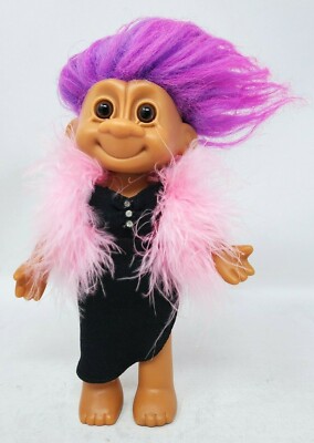 RUSS TROLL DOLL WITH PURPLE HAIR WEARING BLACK DRESS AND PINK BOA