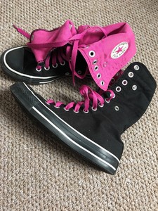black and pink converse high tops