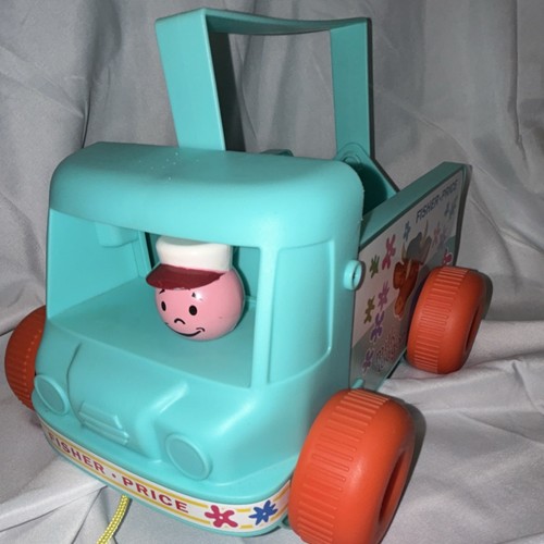 Fisher-Price Pull Toy Milk Wagon with Driver and Colorful Wheels