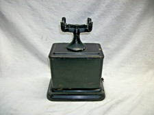 1938 steel phone absent the handset, magneto, and crank