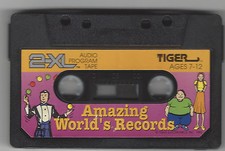 TIGER ELECTRONIC 2XL TALKING ROBOT CASS TAPE PLAYER TOY AMAZING WORLD'S RECORDS
