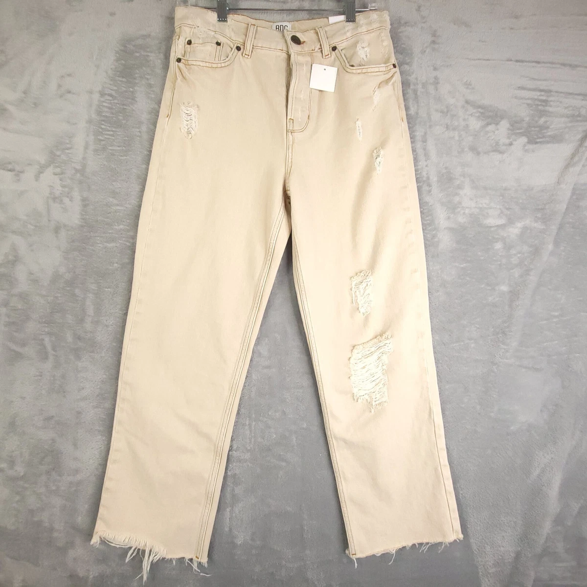Beige distressed store jeans